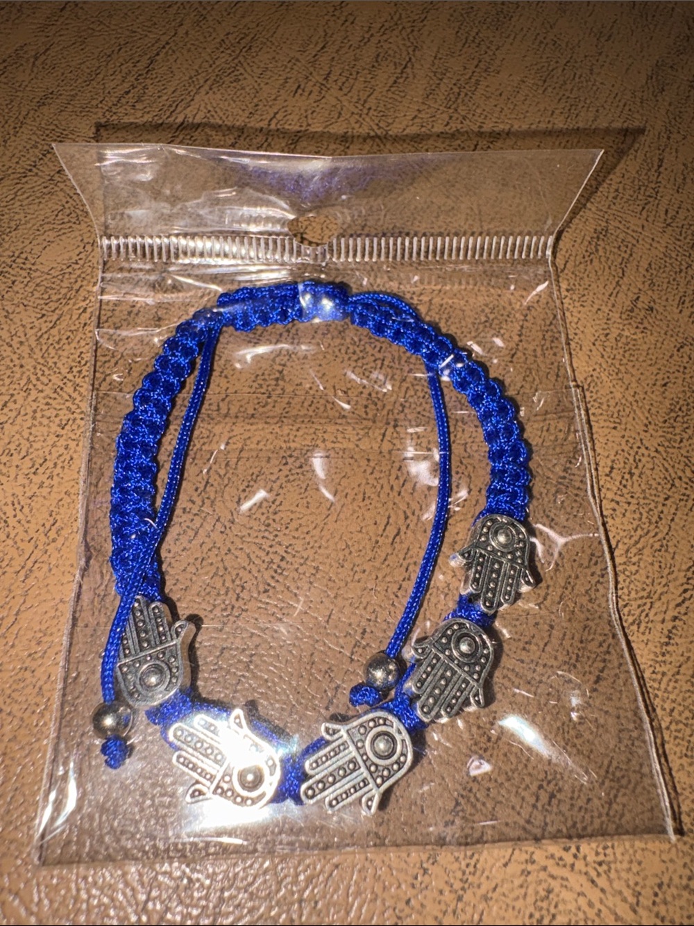Blue Braided Bracelet with Hamsa Hand Charms